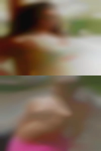 A lady with a single women warm smile.